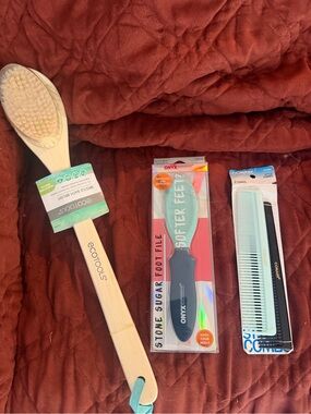 ecotools Bamboo Long Handle Body Brush with Teal Loop on Rust Background